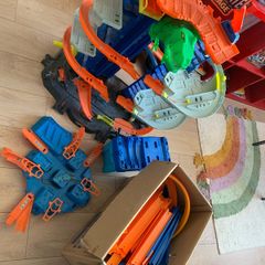 Collection of Hot Wheels track sets and accessories