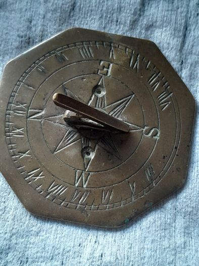 old miniature sundial