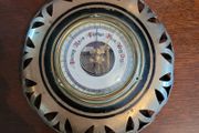 Antique brass weather barometer
