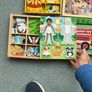 Jigsaw puzzles and magnetic dress up toys Image 2