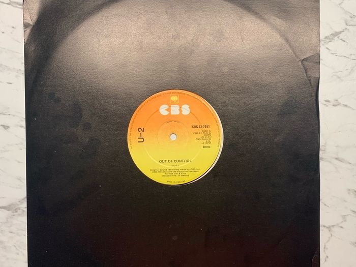 U2 - "Three" - 12" Vinyl  from 1979 - CBS 12-7951 - Second Release - Plain Black Sleeve, CBS Sunburst Labels