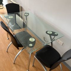 glass dining table with 3 leather chairs