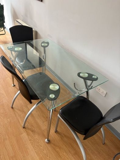 glass dining table with 3 leather chairs