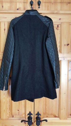 Exhibit black winter coat