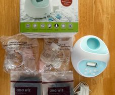 Spectra S1 Plus Hospital Grade Double Electric Breast Pump. As New with 2 NEW Pumping Bras