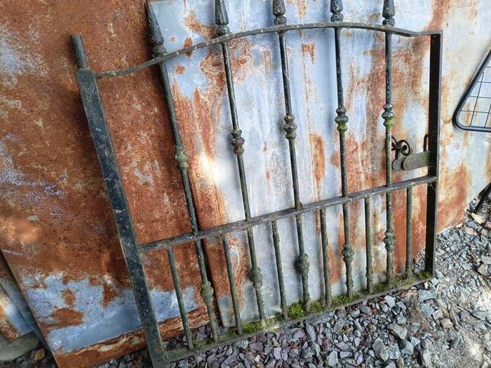 : Antique wrought iron garden gate.
