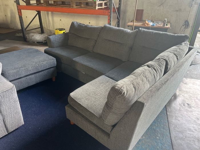 grey corner sofa with matching footstool
