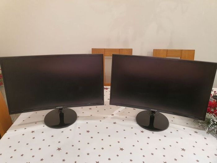 Two Samsung curved Monitors.