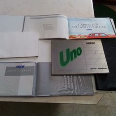 Fiat Uno Car Hand Book.