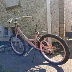Bike/Stroller/tonka truck/ironing board/weight bench.