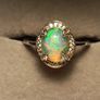 Ethiopian Welo Opal and Lab Grown Diamond Oval Cluster Ring. Image 3