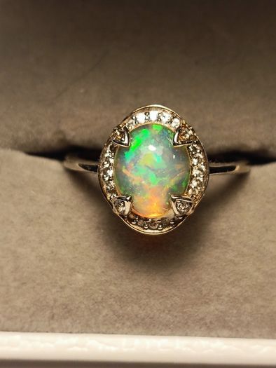 Ethiopian Welo Opal and Lab Grown Diamond Oval Cluster Ring.