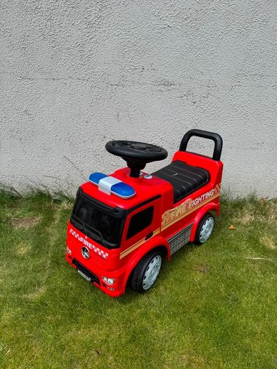 Fire fighter sit on truck