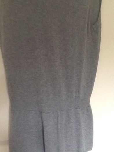 Sleeveless cardi with two patch pockets. Bought at carriage Donna.
