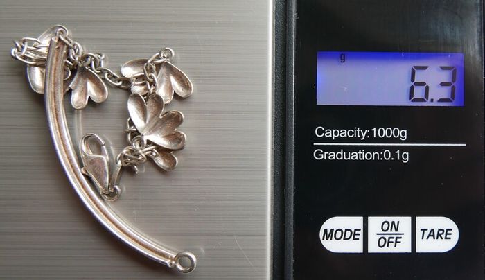 Vintage 925 Sterling Silver charm bracelet with flower charms