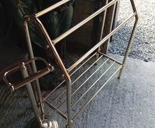 Vintage towel rail and toilet roll holder brass coloured finish.