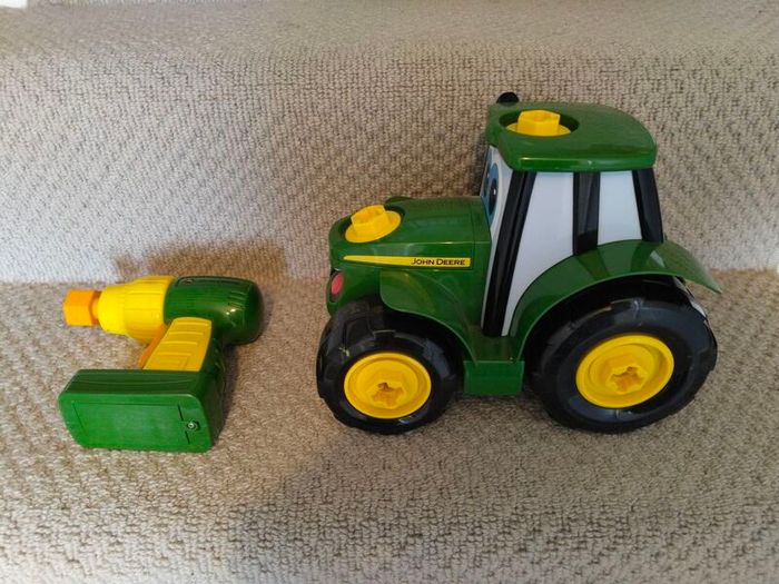Tractor toy with drill