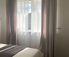 Designer Elegant Pair of Crushed Velvet Curtains in soft beige. Spain.