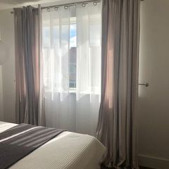 Designer Elegant Pair of Crushed Velvet Curtains in soft beige. Spain.