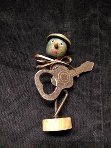 Guitar shaped bottle opener