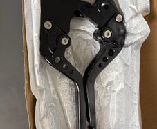 Adjustable clutch and brake levers