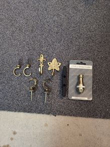 Curtain tie backs and brass pull for blind