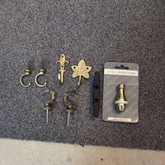 Curtain tie backs and brass pull for blind