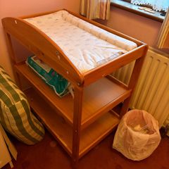 Solid wood changing unit