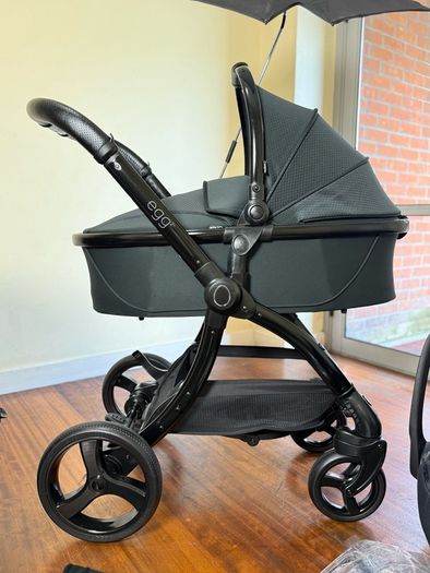As New Egg2 travel system with Cybex car seat and isofix base swivel