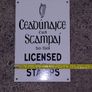 Irish antique style Enamel and Metal Sign. Licensed to Sell Stamps Image 4