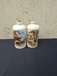 By post only 2 pottery bottles