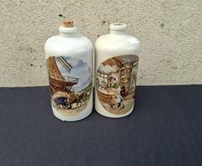 By post only 2 pottery bottles