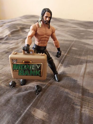 wwe Brand New Seth Rollins Ellite with extras