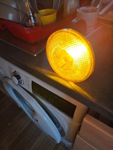 Large Theatrical or Display Lighting, including reflector lamps and colored PAR-style bulbs, with various lamp holders, plugs, and coiled electrical leads all working