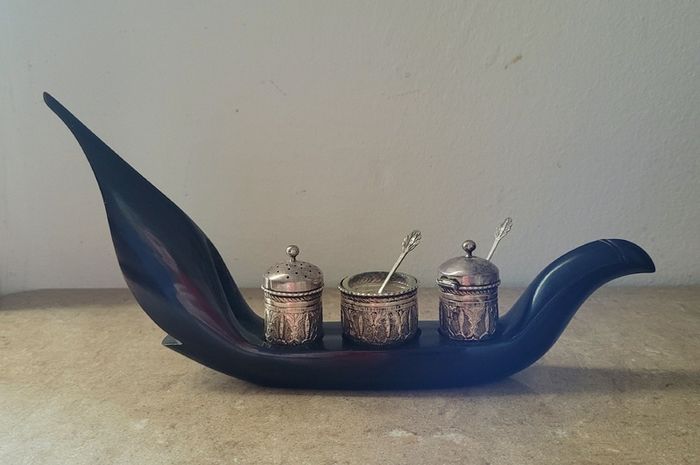20th Century malaysian silver condiment set in carved/polished horn base tray of a bird