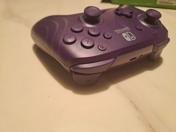 Nintendo Switch PDP Afterglow Wave Purple controller