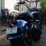 Fully Electric Chopper/Harley looks like a motorbike with matching side boxes Image 2