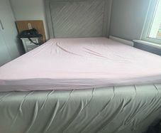 Grey velvet king size bed with mattress under bed storage