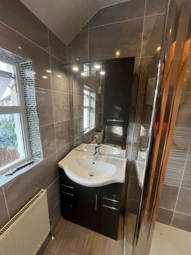 Bathroom Sink and Cabinet