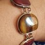 A vintage bracelet featuring natural stone accents. Image 4