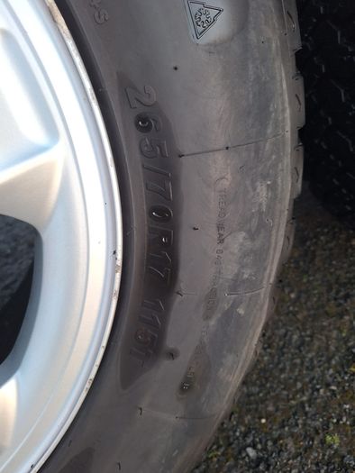 Tires with aluminum rims 265/70/17. A/T