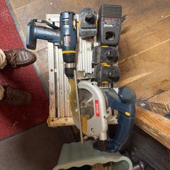 ryobi. Screw driver and saw 3 batteries and charger