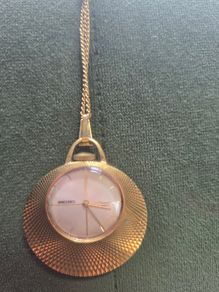 Gold necklace watch