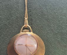 Gold necklace watch
