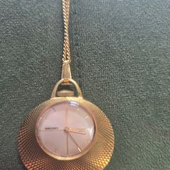 Gold necklace watch