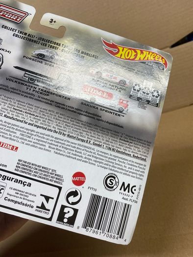 Nissan Skyline R34 Nismo Team Transporter Hot Wheels Creased Card