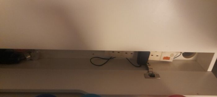 white ikea desk and two chairs