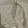 white sleeveless blouse Image 2