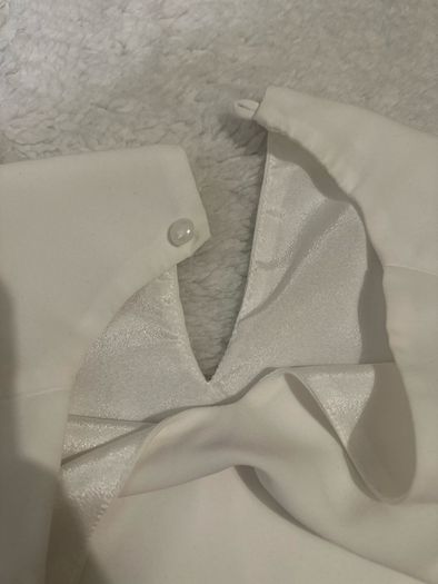 white sleeveless blouse