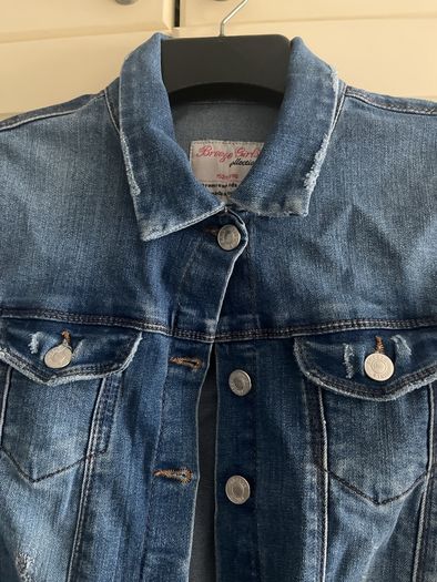 Destressed look denim jacket